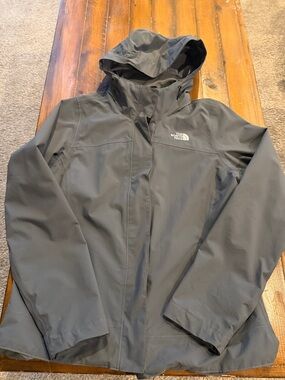 The North Face womens Dark Gray Hooded Rain Jacket